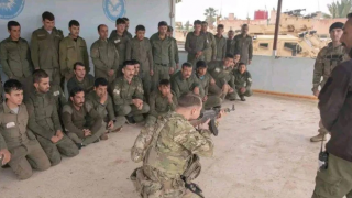 ABD askerleri PKK'lılara silah eğitimi verdi
